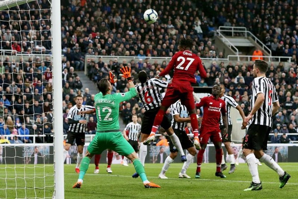 Origi was the hero for Liverpool on a exciting night at St James' Park. EFE