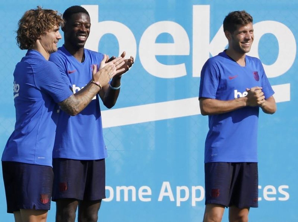El Barça negocia con Busquets, Griezmann y Sergi Roberto. EFE