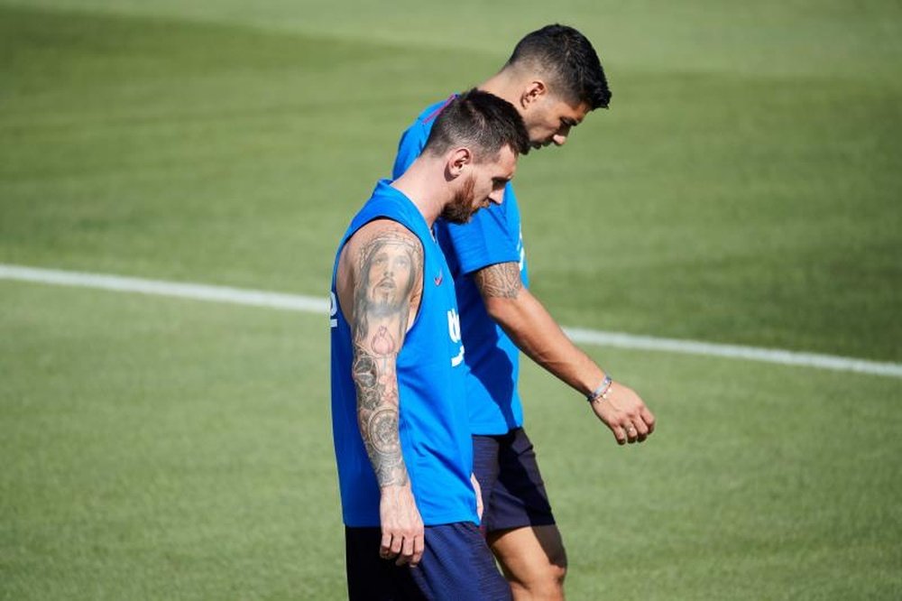 Messi e Suárez ainda n4ao treinam com o grupo. EFE/Alejandro García