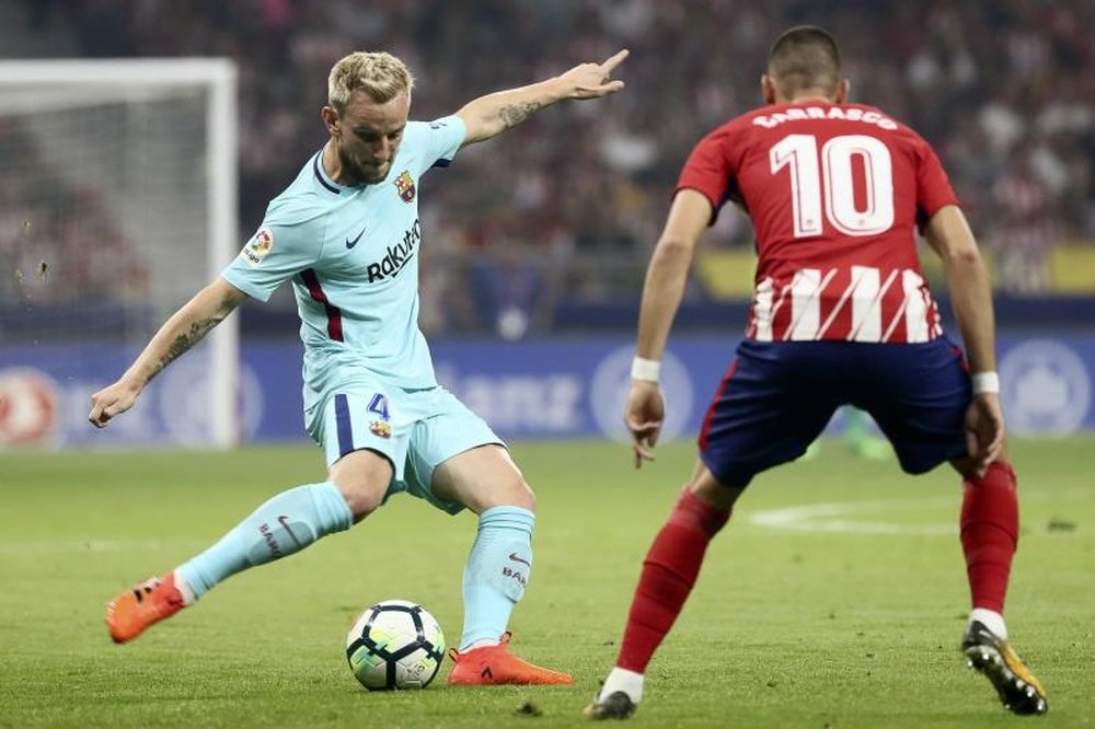 Rakitic podría jugar en el Giuseppe Meazza. EFE