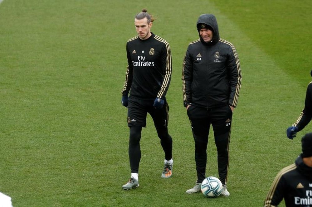 Berbatov aconsejó a Bale. AFP