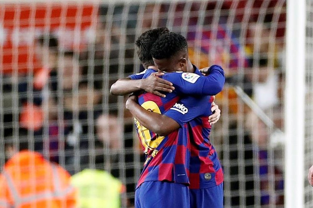 Ansu Fati (R) played down comparisons with Lionel Messi. EFE