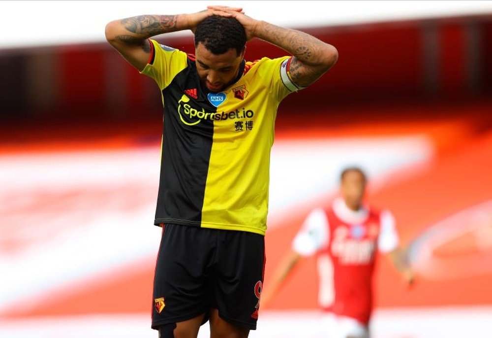 Troy Deeney and Watford are relegated from the Premier League after losing 3-2 at Arsenal. EFE