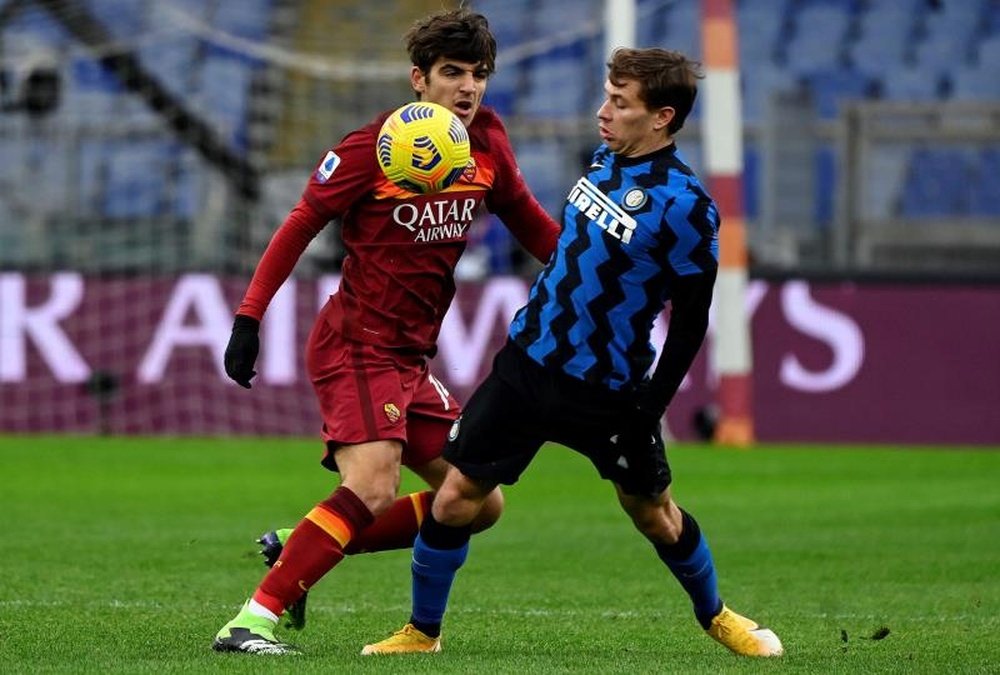 Roma's Gonzalo Villar (L) in action against Inter's Nicolo' Barella (R) during the Serie A. AFP