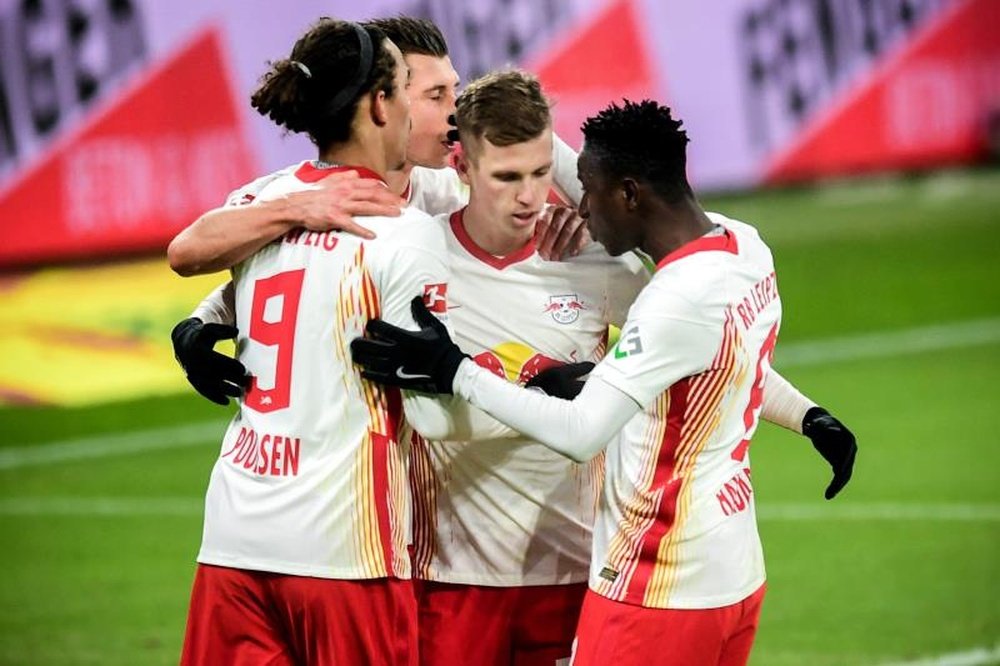 El RB Leipzig juega con fuego, pero cumple contra el Augsburg. AFP/Archivo
