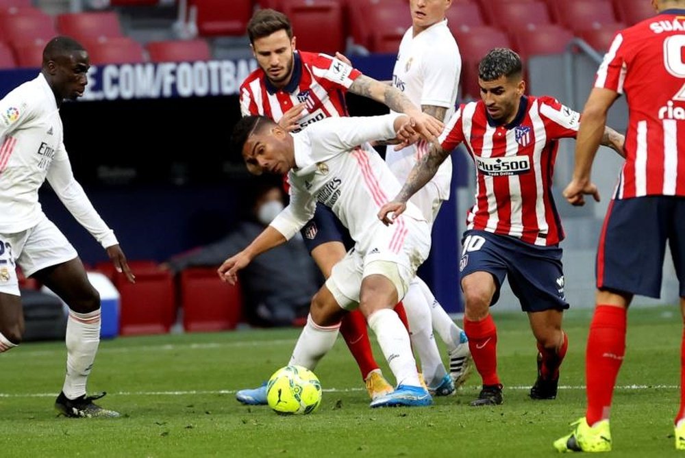 Atlético e Real Madrid empataram em 1 a 1 pela 26ª rodada do Campeonato Espanhol. EFE/JuanJo Martín
