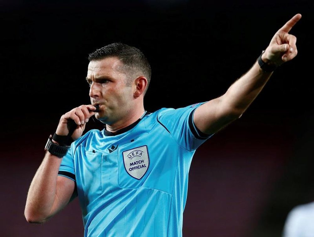 Michael Oliver was criticised for Switzerland's red card versus Spain. AFP