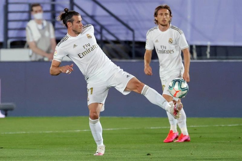 Bale não esquece o seu amor pelo golf. AFP
