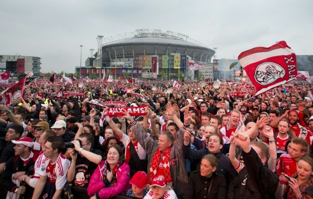 Ajax Amsterdam fans celebrate at the Ajax Arena Park in Amsterdam on May 3, 2012