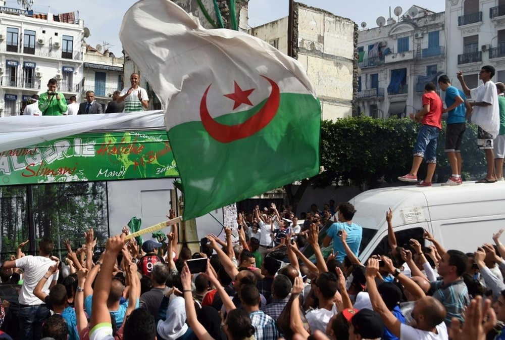 Algerian national team players are greeted by fans upon their return from the 2014 FIFA World Cup on July 2, 2014, in the capital Algiers.