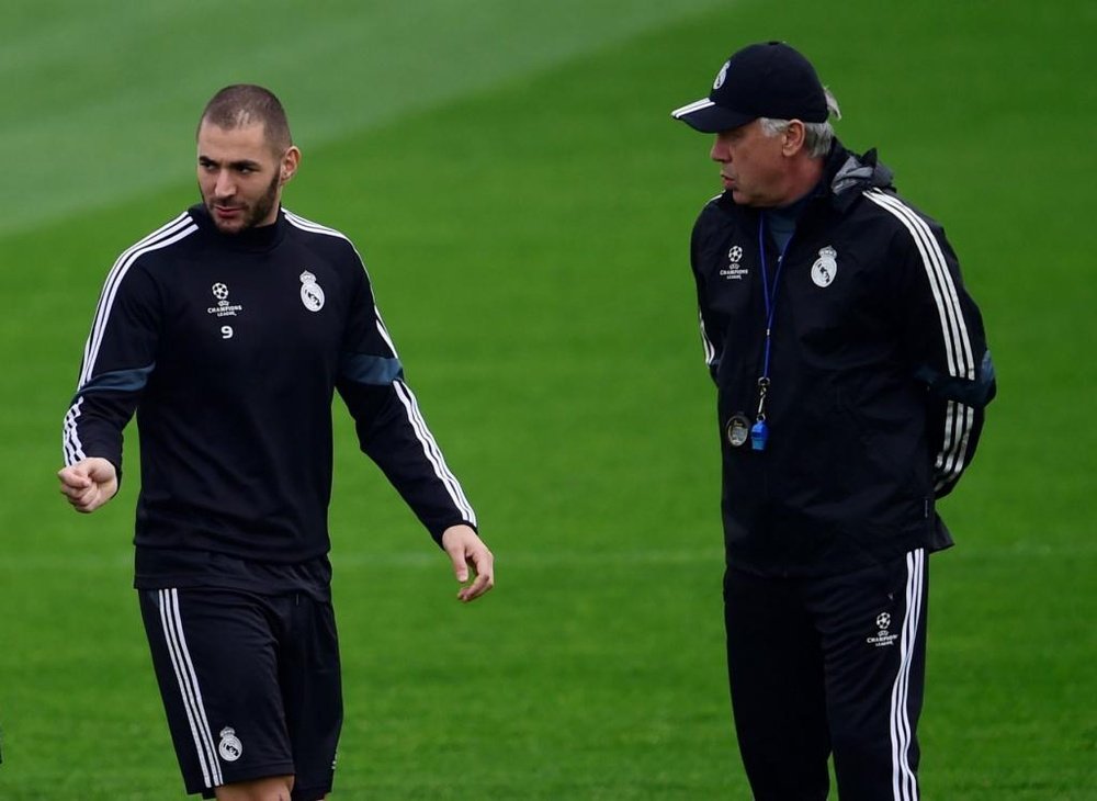 Ancelotti and Benzema have worked together in the past. AFP