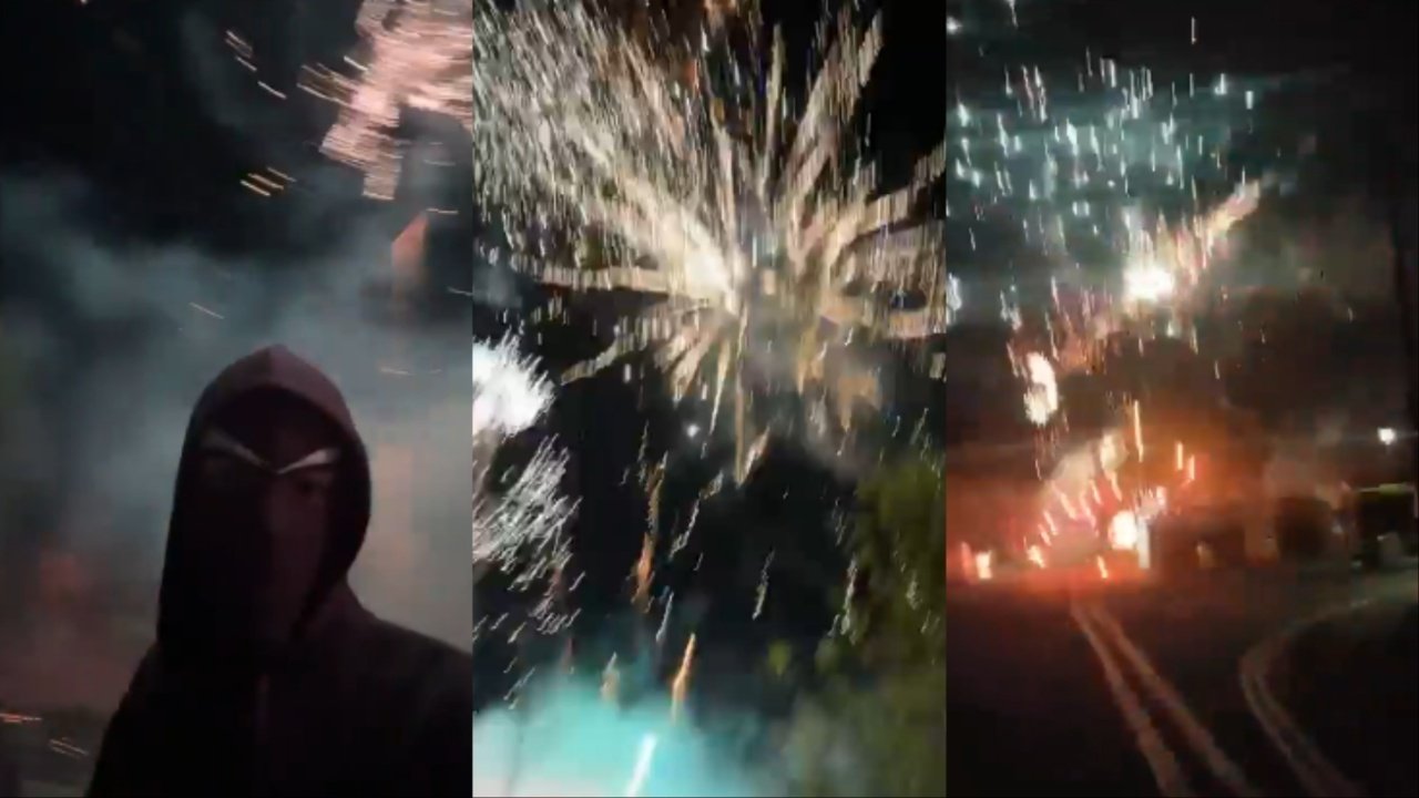 Arsenal fans set off fireworks outside Man City's hotel