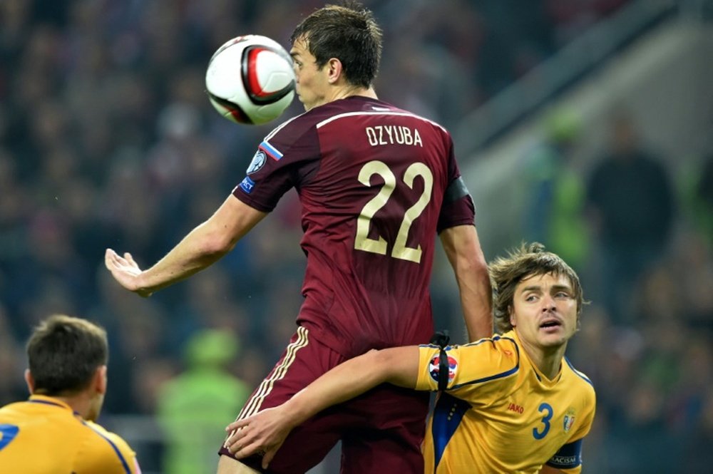 Artem Dzyuba, centre, seen in action with Russia national team against Moldova in October 2014, will play club football for Zenit this year