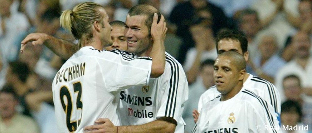 Beckham hugging Zidane. Real Madrid