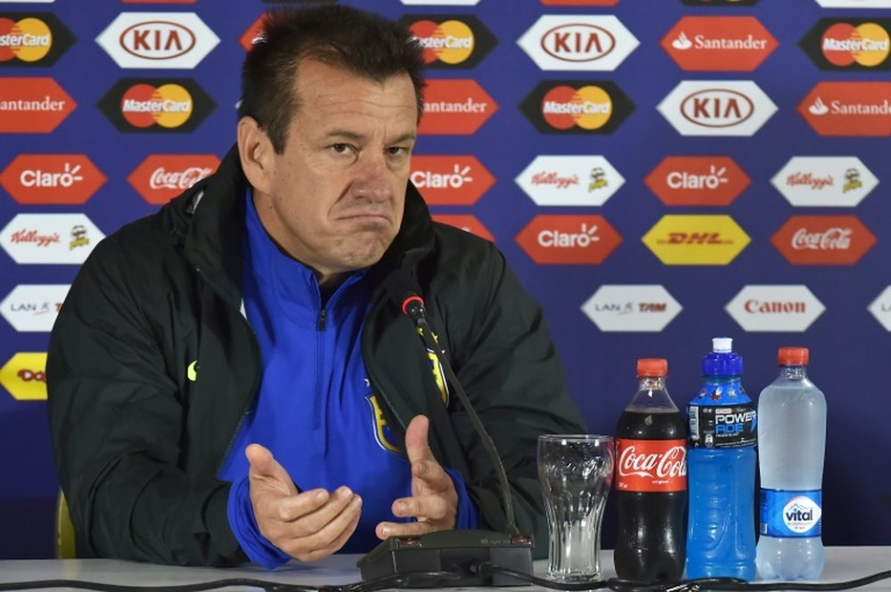 Brazil national football team coach Dunga speaks during a press conference at the Ester Roa stadium in Concepcion, Chile, on June 26, 2015