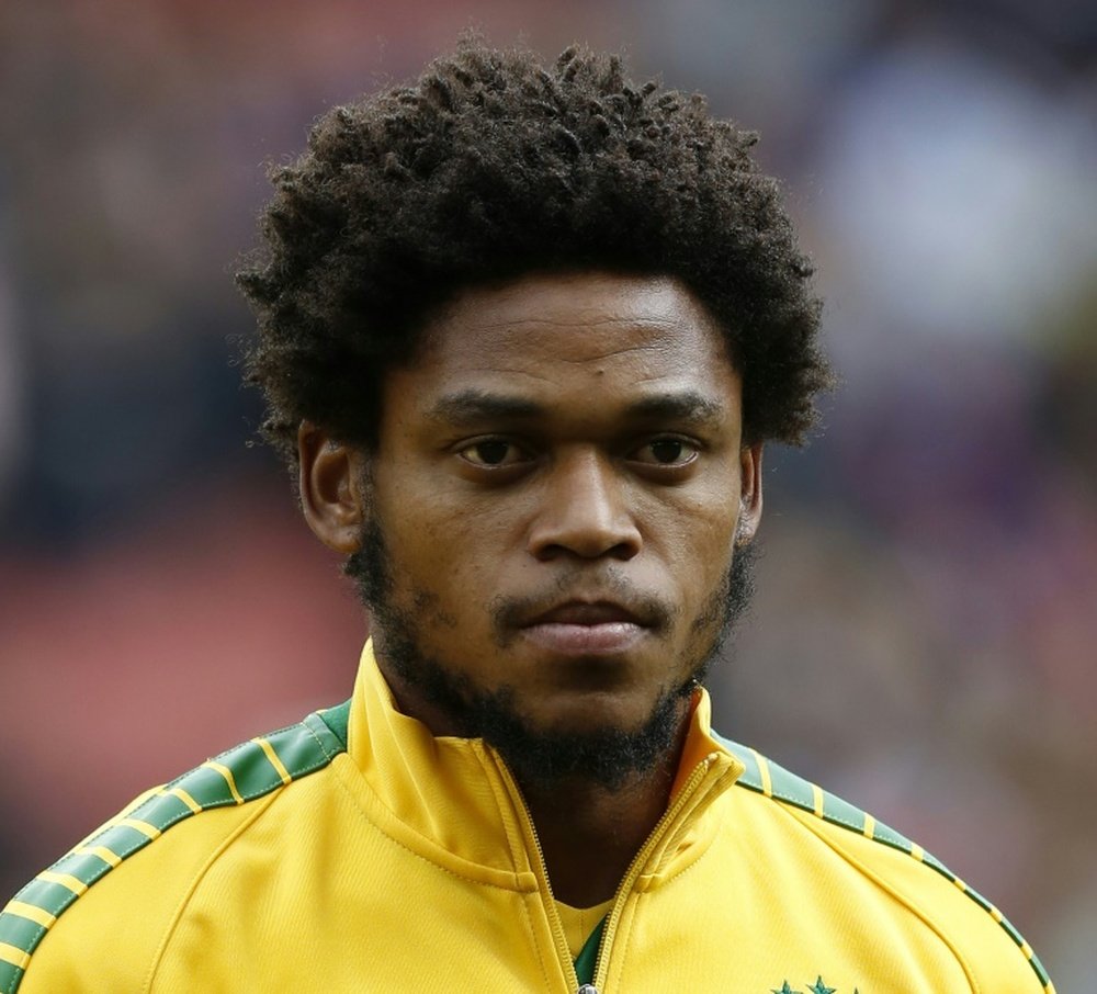 Brazil striker Luiz Adriano lines up ahead of the friendly international football match between Brazil and Chile at The Emirates Stadium in London on March 29, 2015