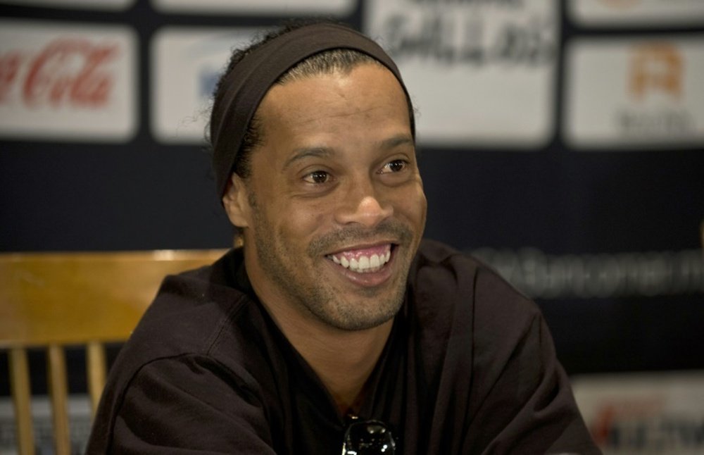 Brazilian footballer Ronaldinho, pictured on September 12, 2014, joins Rio side Fluminense, the fourth Brazilian club of his widely-travelled career