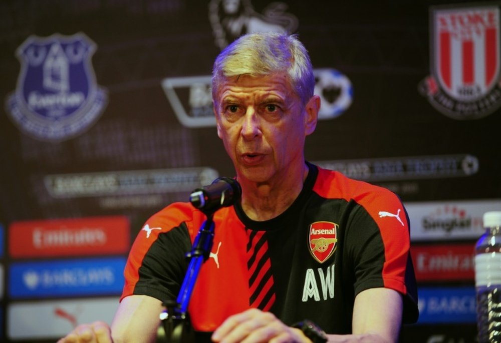 British Premier League football club Arsenal manager Arsene Wenger speaks during a press conference for the Barclays Asia Trophy 2015 (BAT) in Singapore on July 14, 2015.