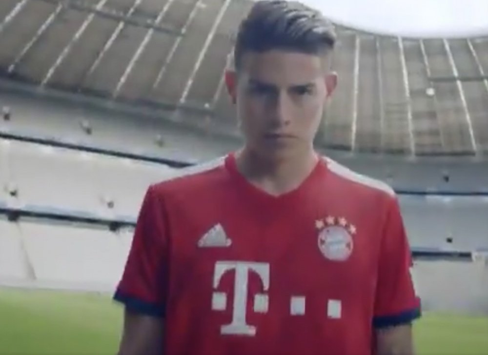 James models the new Bayern first kit. FCBayern