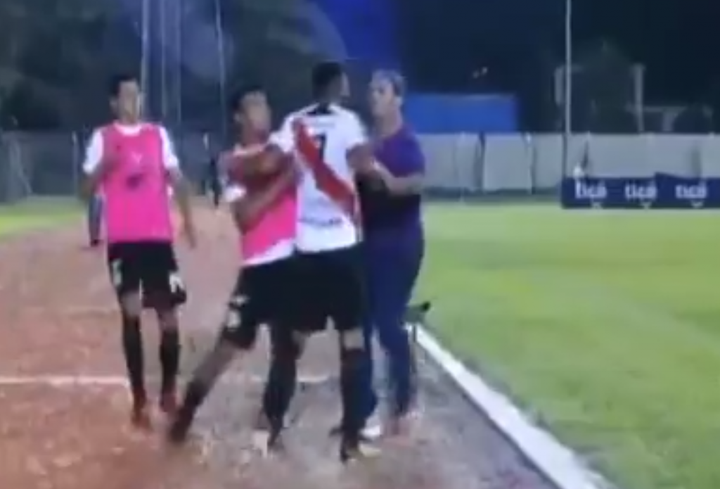 Bolivian player fights his own manager after being subbed...and gets red carded