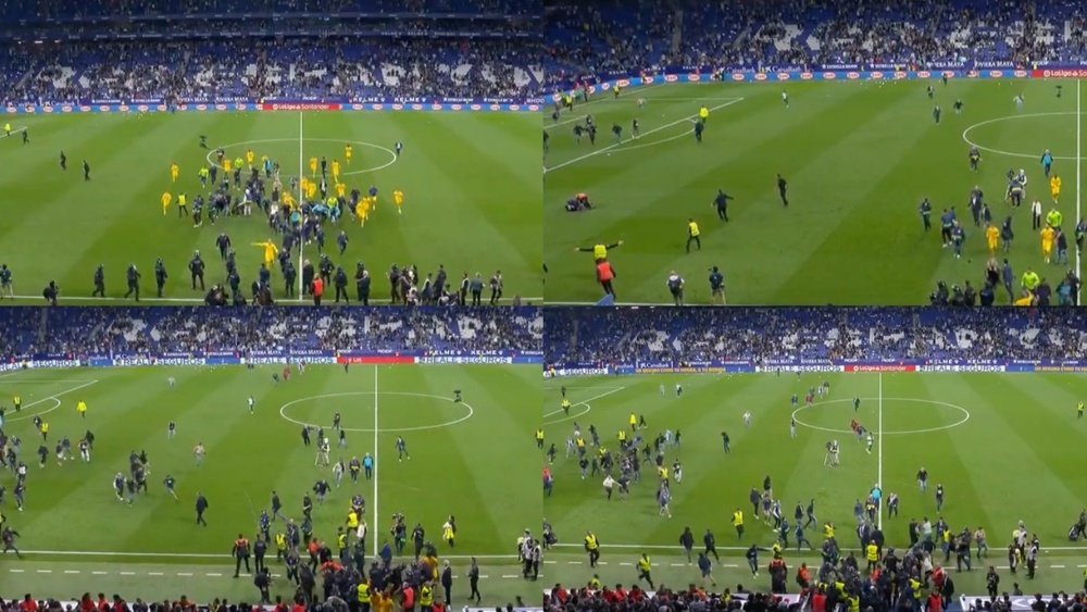 Vergonha: os jogadores do Barça fugiram do campo por uma invasão da torcida do Espanyol. Captura/ESP