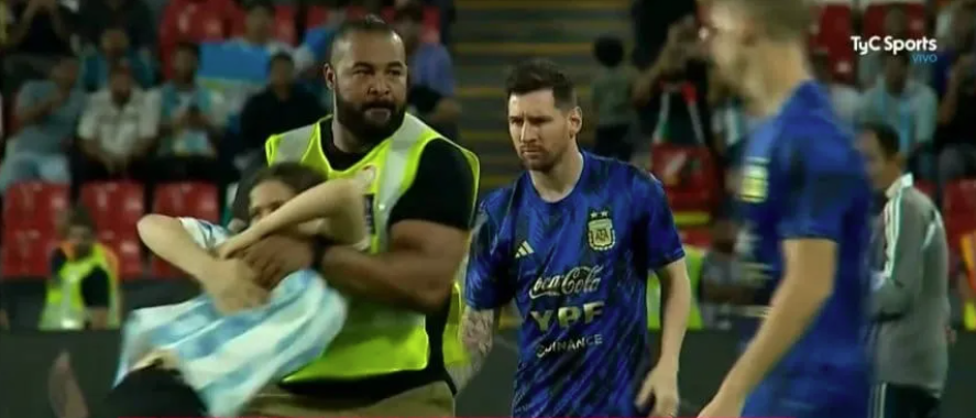 Another pitch invader tries and fails to reach Messi