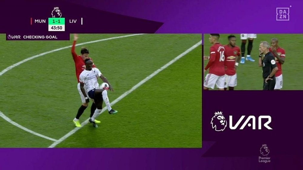 VAR didn't see United's foul... But it did catch Mane's handball. Screenshot/DAZN