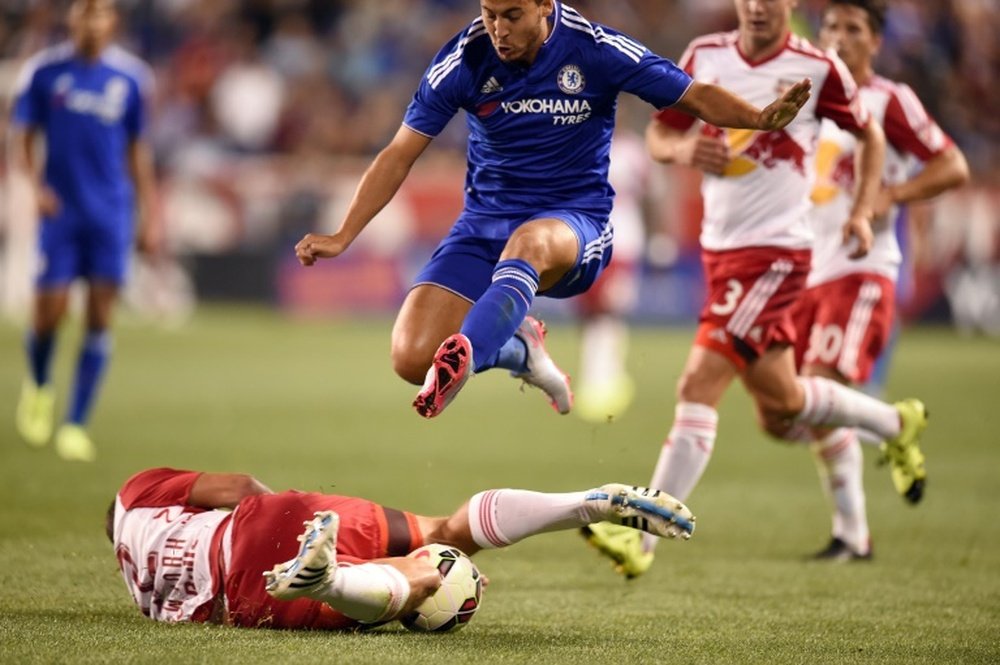 Chelsea midfielder Eden Hazard, wearing blue, in action as the English champions went down to the New York Red Bulls 4-2