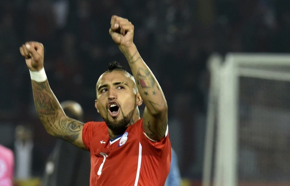 Chile Arturo Vidal celebrates at the end of the Copa America match against Uruguay, in Santiago, on June 24, 2015