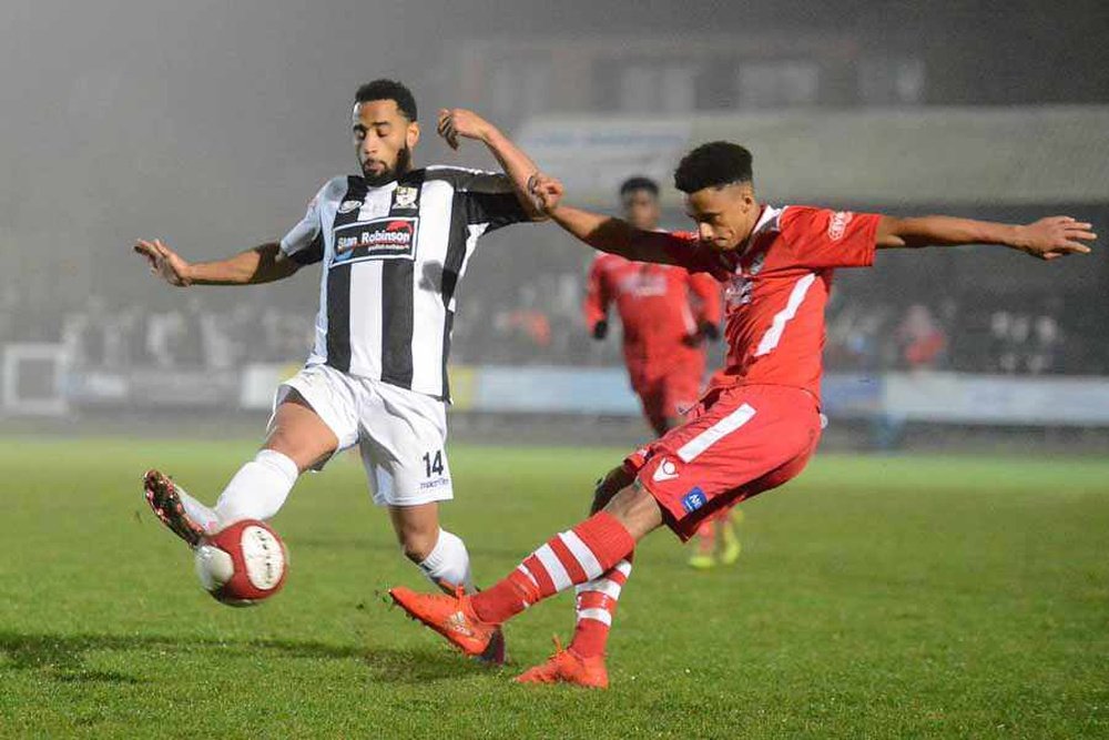 Cohen Bramall (right) in action for Hednesford Town. Hednesford Town