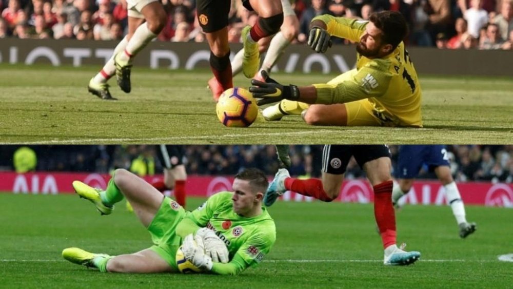 Two of the best goalkeepers this season, head to head. AFP/Archivo