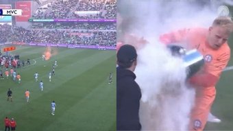The Melbourne derby was abandoned after the goalkeeper was hit by a bin. Screenshot/Paramount