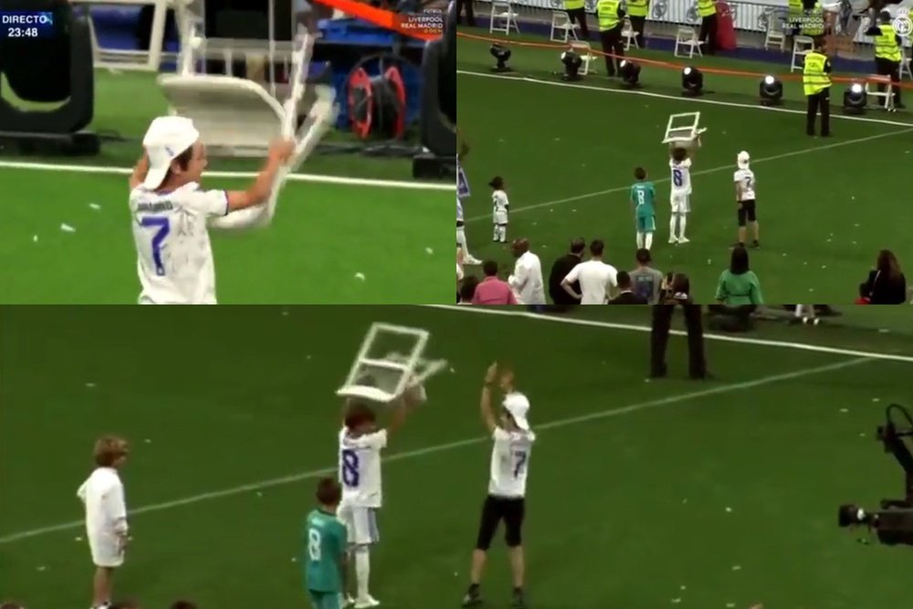 Los hijos de Hazard y Kroos emularon a Alaba con la silla. Captura/RealMadridTV