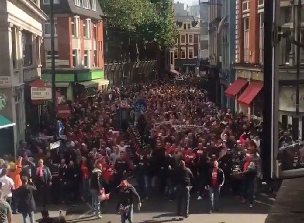 Cologne fans march through London. Twitter