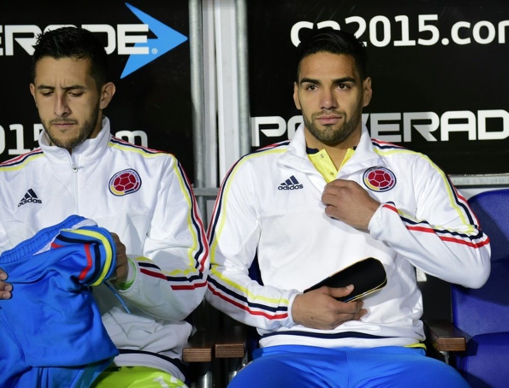 Colombia forward Radamel Falcao Garcia (R) and goalkeeper Camilo Vargas are seen before the start of the 2015 Copa America football championship quarterfinal match Argentina vs Colombia, in Vina del Mar, Chile on June 26, 2015