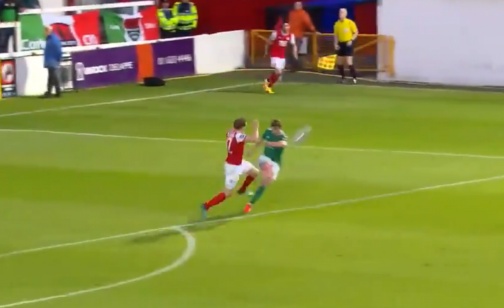 Footballer scores goal from inside his own box