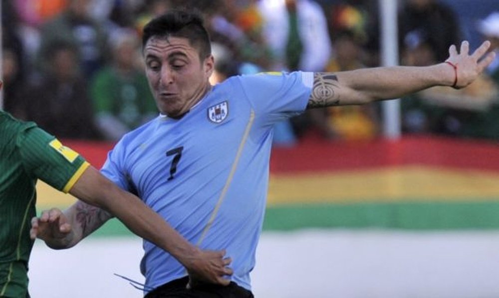 Cristian Rodríguez no jugará los dos partidos por lesión. AFP