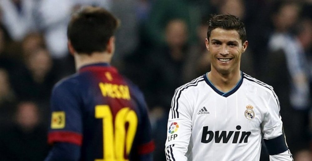 Cristiano Ronaldo y Leo Messi, en un partido. EFE