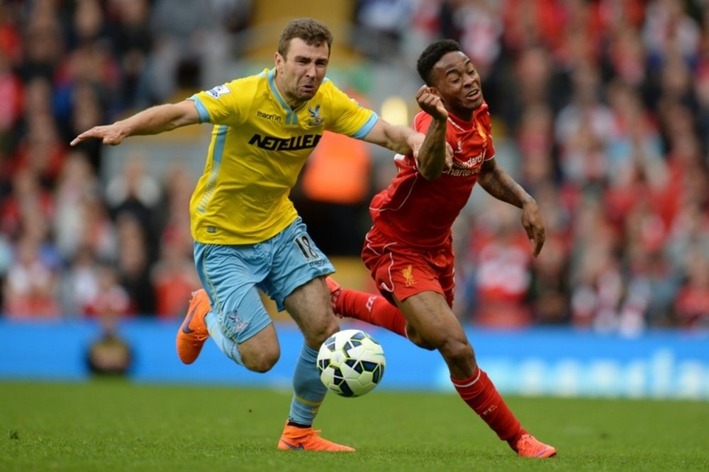 Crystal Palace Scottish midfielder James McArthur (L) during the English Premier League football match against Liverpool on May 16, 2015