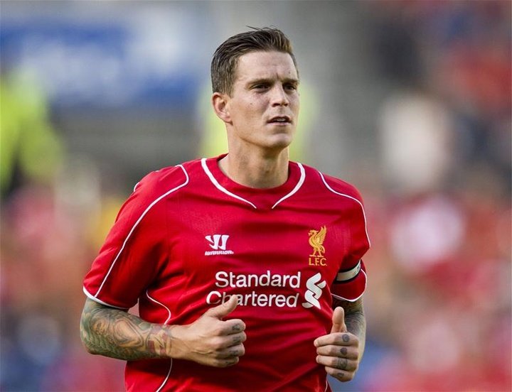 Former Liverpool star Agger retires aged 31