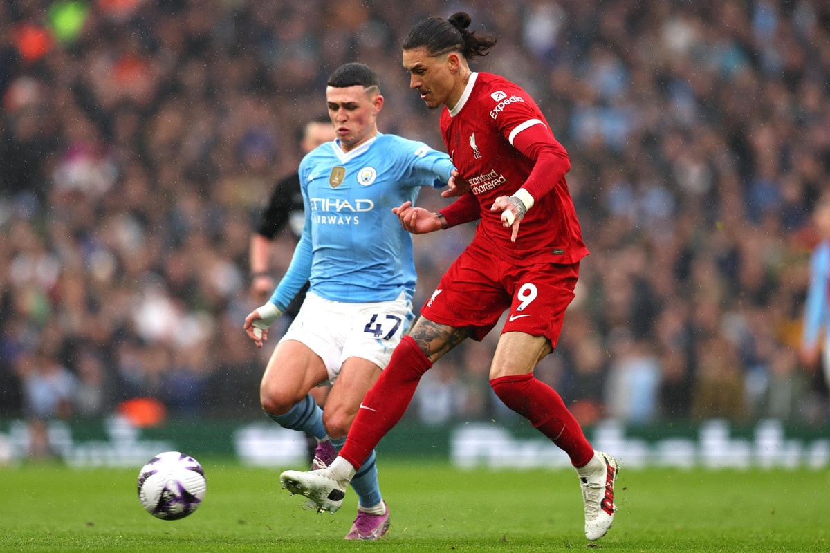 Liverpool and Man City share spoils in roller coaster draw