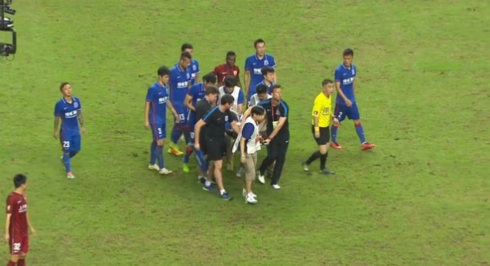 Ba is stretchered off after suffering a horrific leg break. Twitter