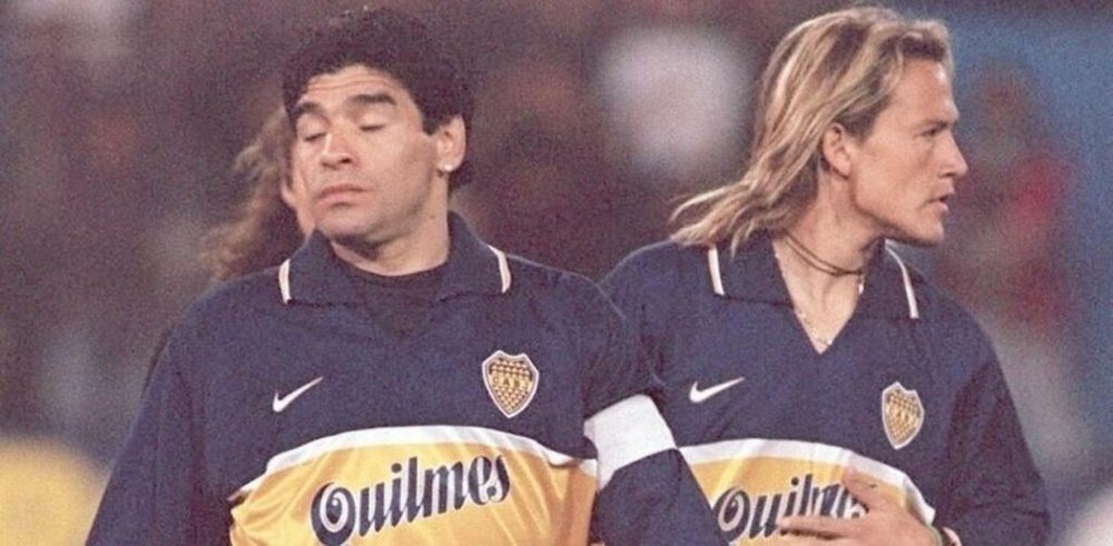 Diego Maradona (L) used to play for Boca juniors. AFP