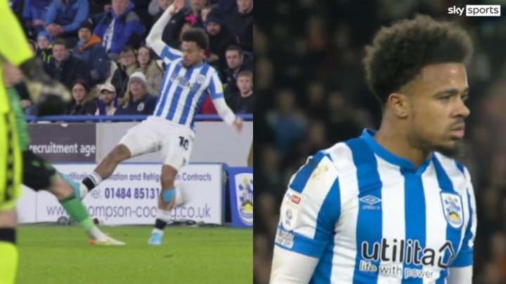 Huddersfield player makes shocking challenge on opponent's knee and ref says no foul!