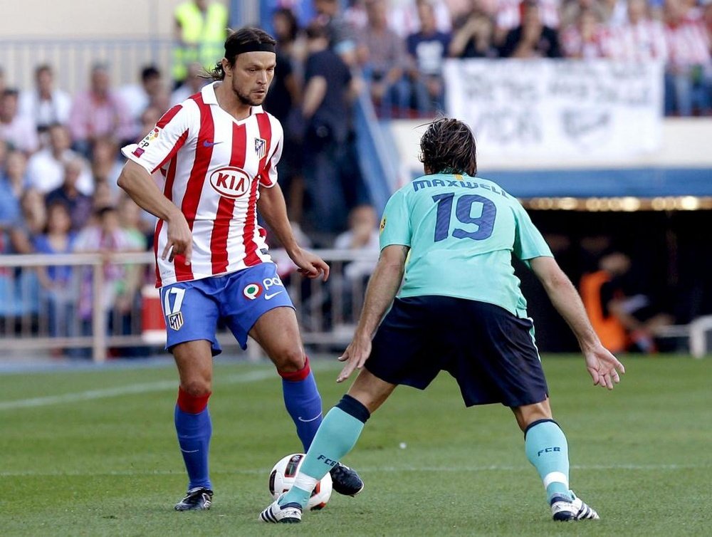 Ujfalusi sigue cargando con las consecuencias de haber lesionado a Messi. EFE/Archvo