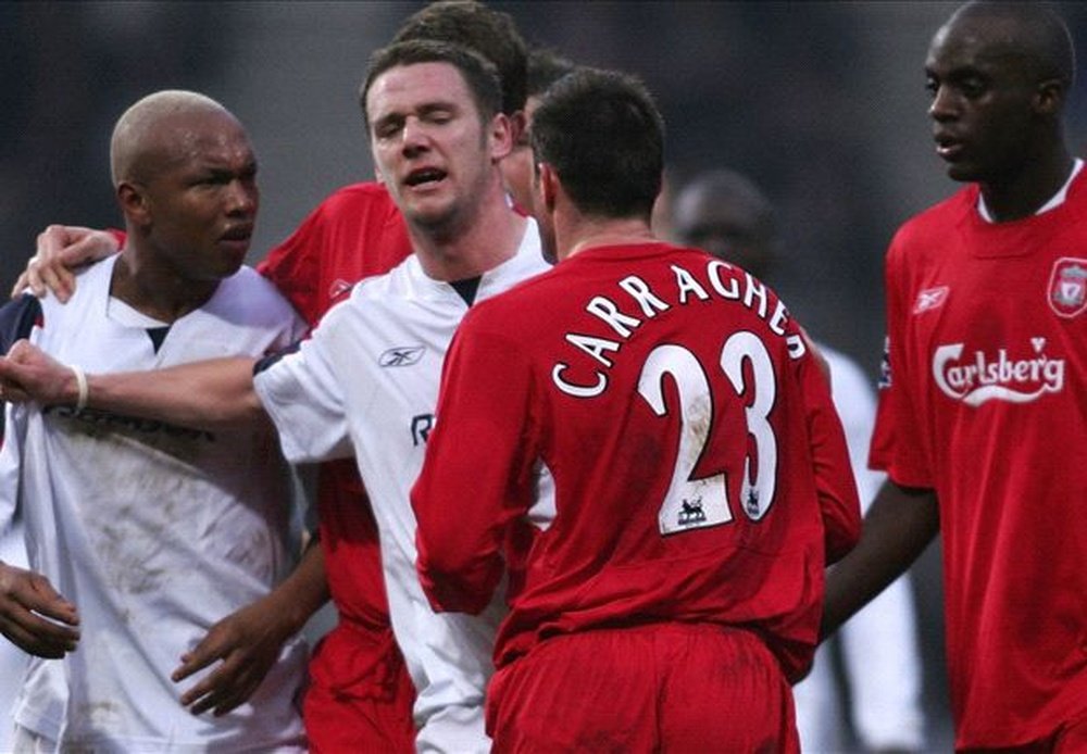 Diouf in action against his former club Liverpool while at Bolton. Twitter/OfficialBWFC