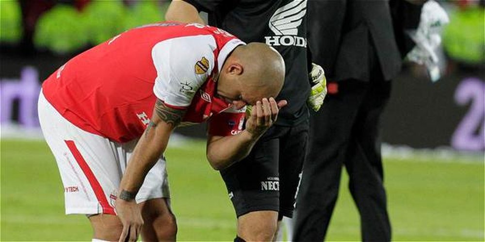El jugador de Santa Fe, Omar Pérez, en el momento de su lesión. Twitter