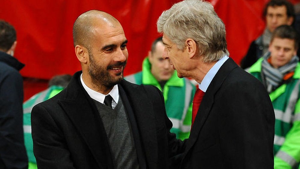 Su-Mourinho? Wenger offers advice to City and United. AFP