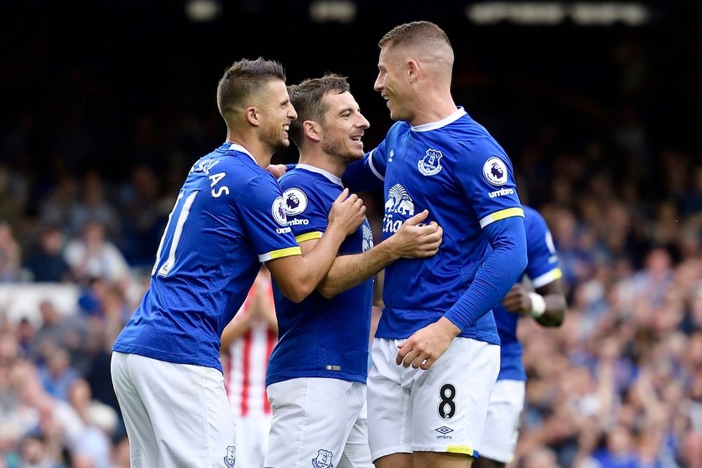 Everton celebrate the one and only goal of the game: Everton