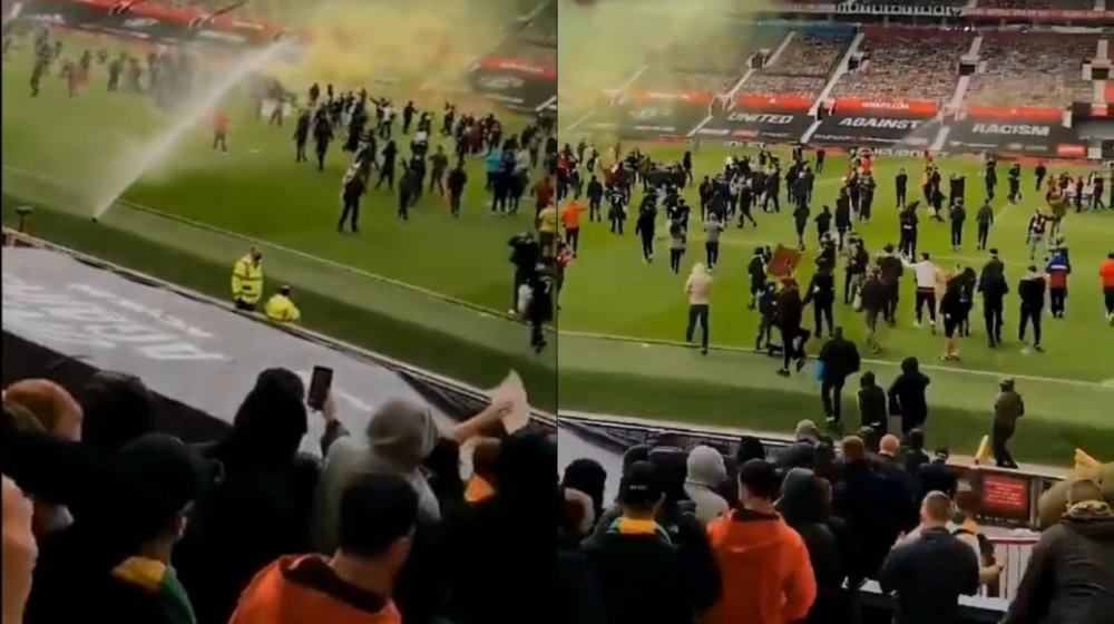 Hundreds of Man Utd fans are on the pitch at Old Trafford. Twitter/NewsForAllUK
